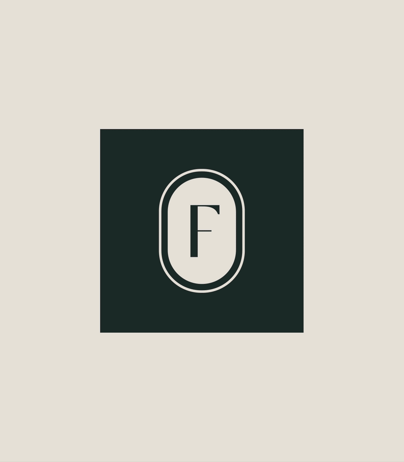 Design du monogramme Flohymont utilisé dans l’identité visuelle et le branding de la marque.