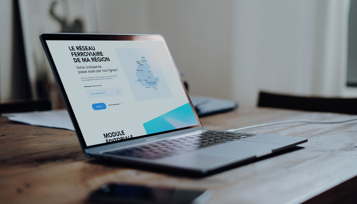 Présentation du design du site SNCF Réseau sur ordinateur portable dans un projet de webdesign et identité digitale.
